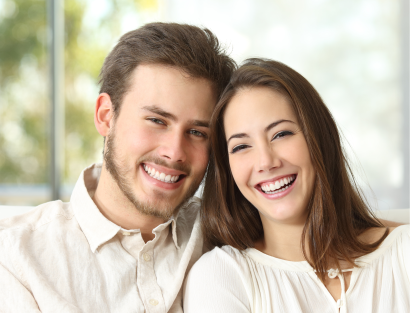 Ccouple smiling after a cosmetic dental treatment with veneers in Bangkok